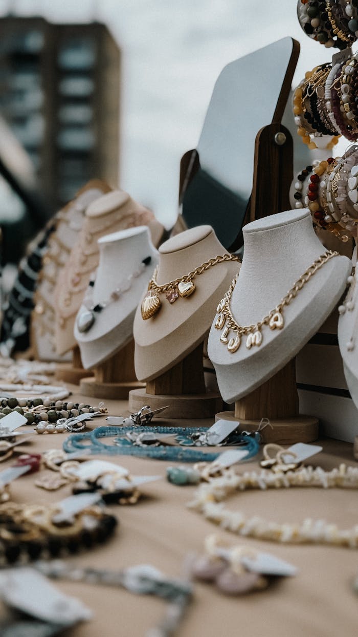 Crafting Captivating Headlines: Your awesome post title goes here Chic display of necklaces and accessories at a street market. Urban shopping experience.